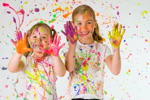 Children with a messy painting project